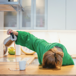 A person sleeping and pouring coffee