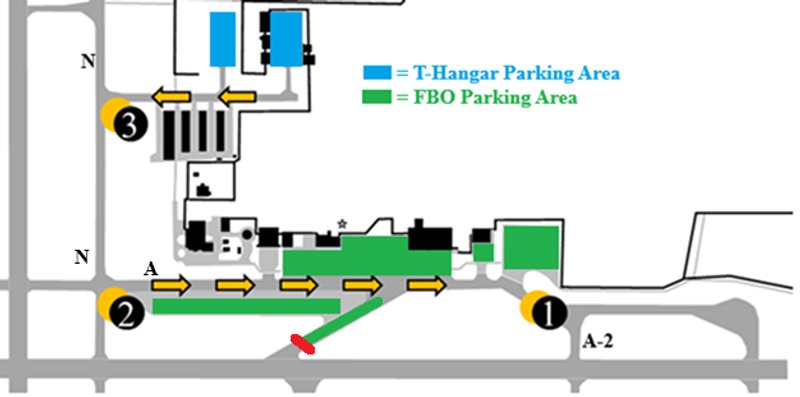A created map of the east corner of the South Bend International Airport airfield including east runway 27 left, taxiway Alpha, taxiway November, and taxi-lane Tango. If the ATIS is advising runway 27 left or 36, this photo shows highlighted in green the FBO parking and highlighted in blue the t-hangar parking areas with the direction to proceed.