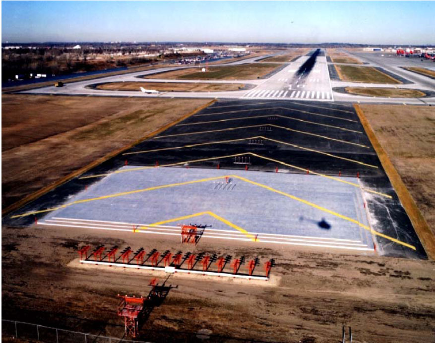 A picture depicting an engineered materials arresting stystem (EMAS) located in the safety area beyond the end of the runway. 