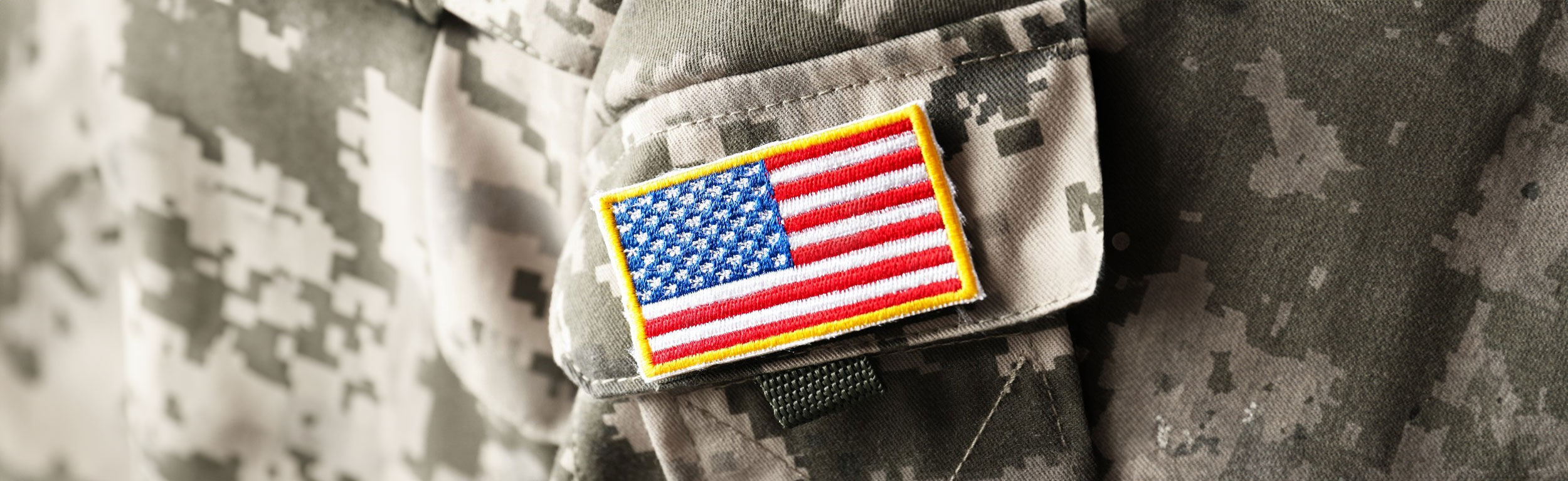 An image of a U.S. army uniform with a U.S. flag patch