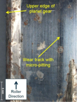 Photo of micro-pitting on the upper outer-race surface. 