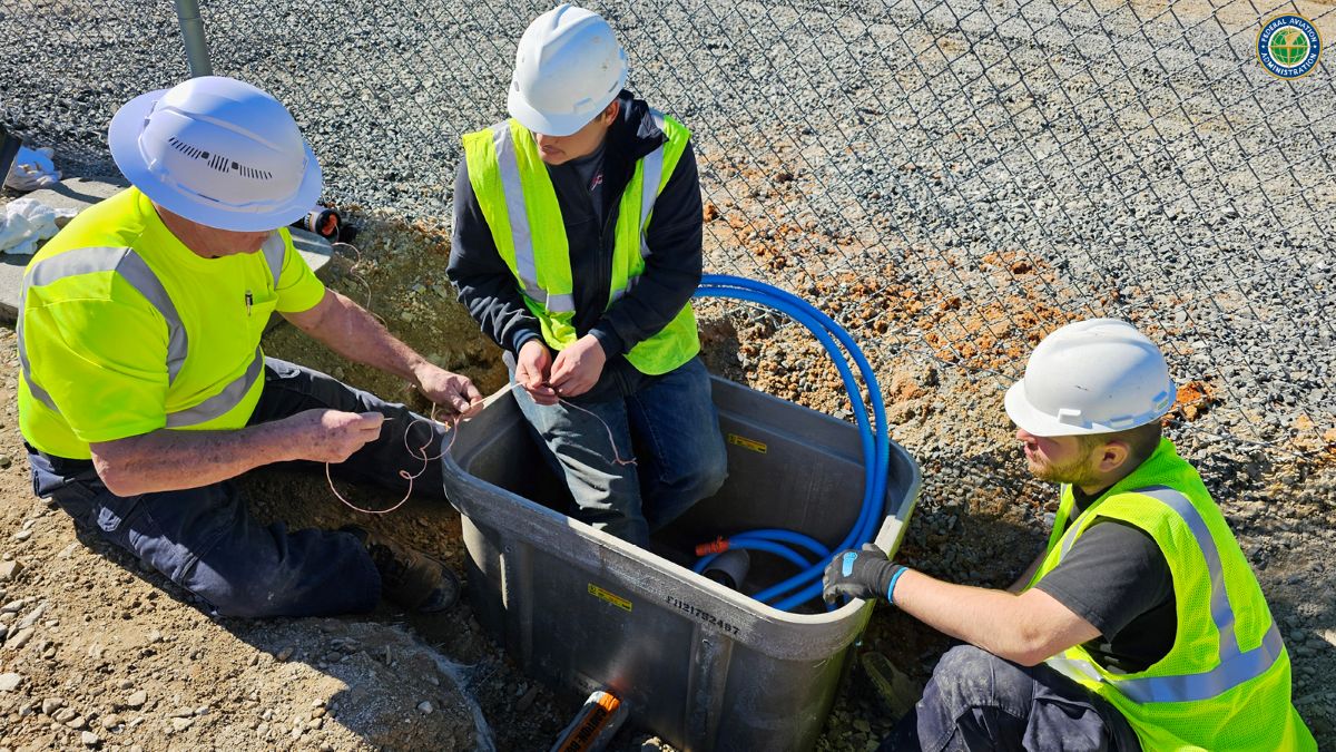 FAA Tech Ops personnel in the field at work