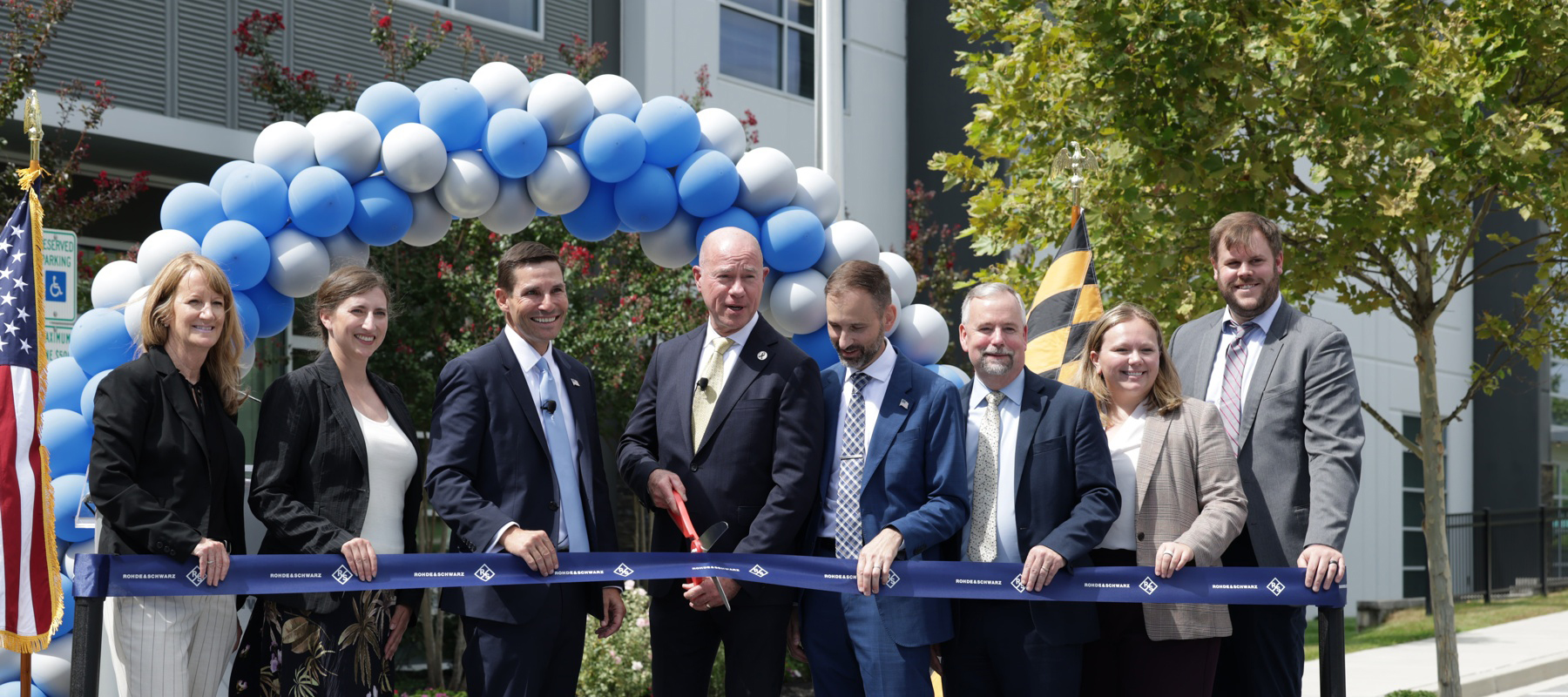 Administrator Bedford at a ribbon cutting ceremony