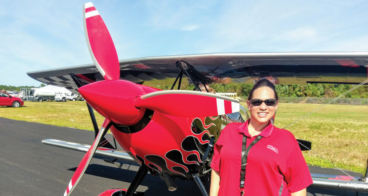 Picture of a woman and an airplane
