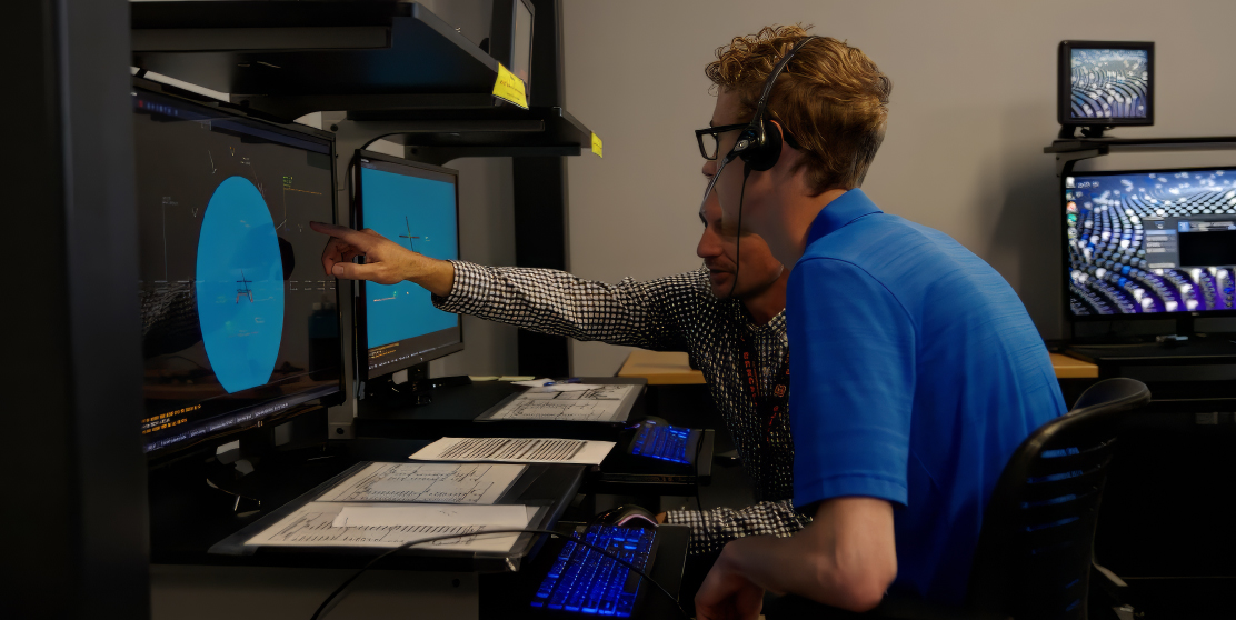 a student learning about ATC equipment