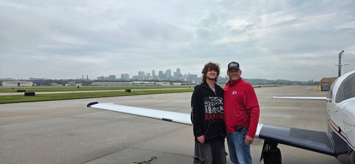Father and son on the tarmac