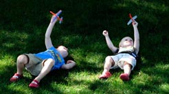 children playing with a toy airplane