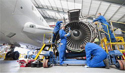 illustration of large plane engine being repaired