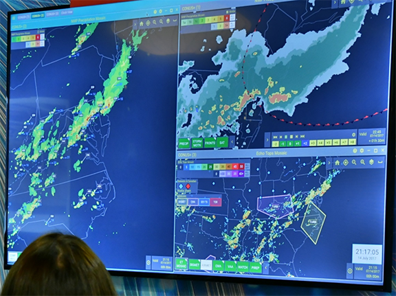 The AWD is a multi-window display, showing here three windows. At left is the Precip product in the mid-Atlantic states, at top right is the 2-hr forecast in the Washington DC area, and at bottom right is Echo Tops with NWS SIGMETS overlaid in the eastern CONUS. Each window has a color legend in the upper left corner and a toolbar for selecting products across the bottom.