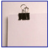 Documents pictured with binder clip