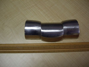 "Photo of a deformed test specimen fuse pin - tested to failure in shear"