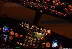 "Photo of a 707 cockpit at night Ivan Koleshov - used with permission"