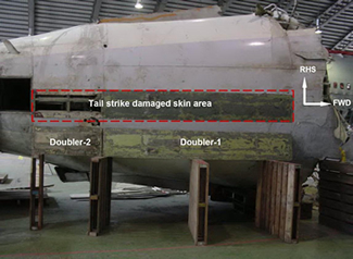 "Photo of retrieved Section 48 fuselage, showing repair doublers similiar to the Section 46 repair doublers which provoked the structural failure"