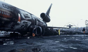 "Wreckage of Flight 603 following takeoff about and resulting ground fire"