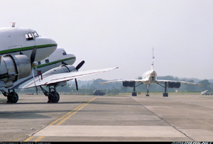 "Photo of Concorde during taxi with DC-3 in foreground Photo copyright George Canciani - used with permission"
