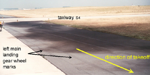 "Left main gear wheel marks"