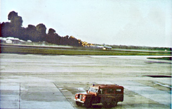 "Photo of British Air Tours Engine Fire on Runway"