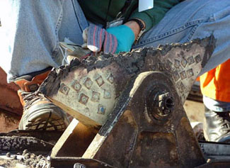 "Vertical Stabilizer Failure at One of the Attach Points - NTSB Photo"