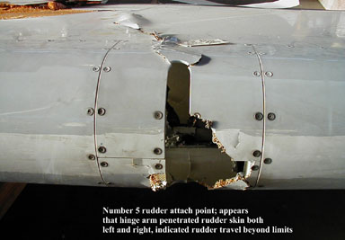 "One of the Failed Rudder Attachment Points - NTSB Photo"
