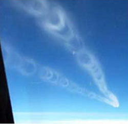 "Inflight Photo showing wake vortices of preceding aircraft revealed by smoke generators Photo copyright NRC Canada - AIAA 2007-289-232"