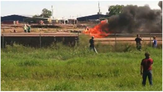 "Photo of Robinson R22B on fire after crash Photo copyright Robinson Helicopter - used with permission"