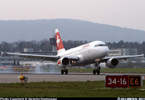 "Example of typical airport signage showing runway 34-16 and taxiway E6 identification Photo copyright Gerardo Dominguez - used with permission"