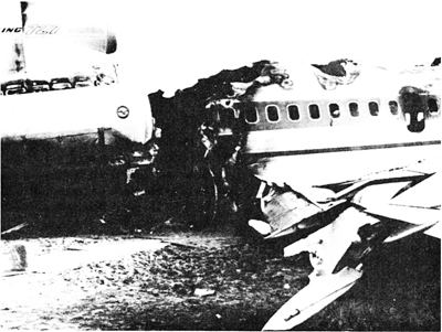 "Aft body, showing hole through which flight attendant and two passengers were rescued. (Aft airstair is at left)"