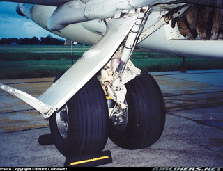 "Photo of Right main landing gear of 727. This gear was severed in the accident Photo Copyright Bruce Leibowitz - used with permission"
