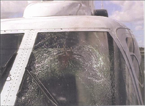 "Photo of S-76C+ helicopter windshield after a bird strike"