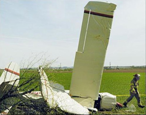 "Photo of Champion 7ECA N11065 wreckage Photo copyright NTSB - used with permission"