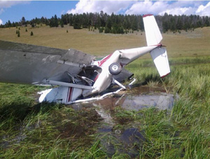 "Photo of Cessna 150 N66255 wreckage Photo copyright NTSB - used with permission"