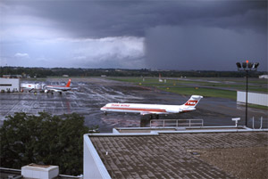 "Photo of rainshaft just beyond approach end of runway Photo copyright George Hamlin - used with permission"