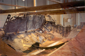 "Photo of recovered forward cargo compartment components indicated presence of an intense fire"