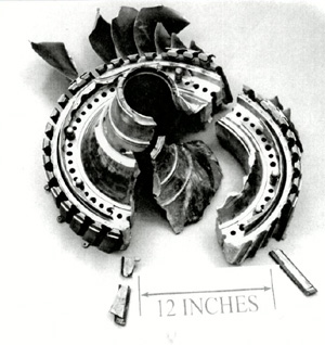 "Photo of fractured fan hub, fractured radially in two places"