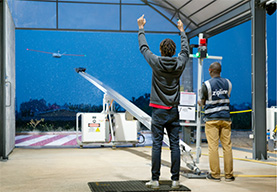 employees testing drones