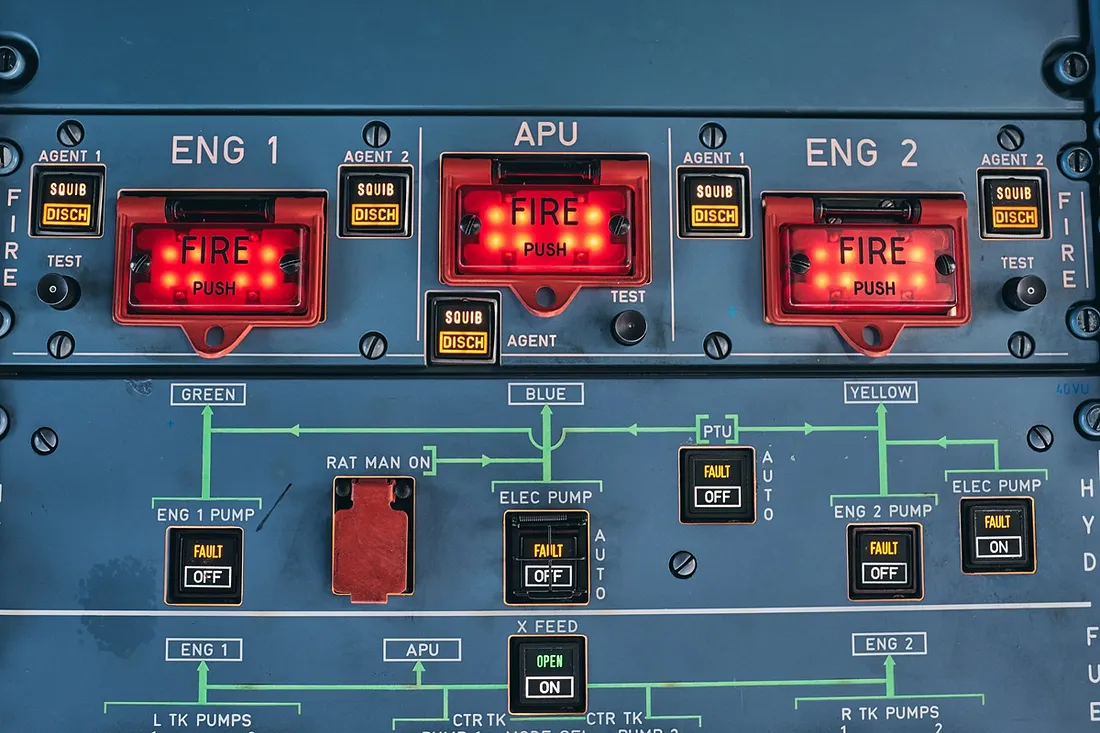 A typical overhead panel on a passenger aircraft showing engine fire detection and extinguishing systems.