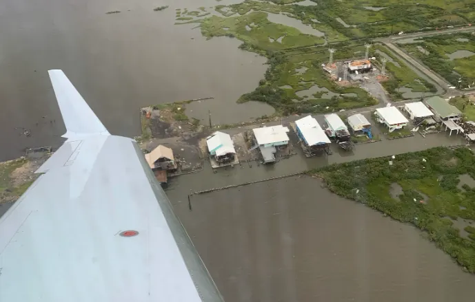 FAA technicians take aerial photographs of hurricane-impacted areas to assess damage to aviation equipment. This photo shows flooding caused by Hurricane Helene in North Carolina. (Photo: FAA)