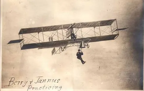 Parachutist Albert Berry perched beneath pilot Tony Jannus. (Photo: Jefferson Barracks Heritage Foundation via The Smithsonian)