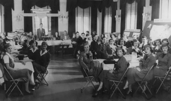 Flight attendants attend their first training conference, where they studied in-flight safety, passenger service, geography and etiquette. These pioneering professionals helped define the standards of commercial air travel. (Photo courtesy of the Association of Flight Attendants)