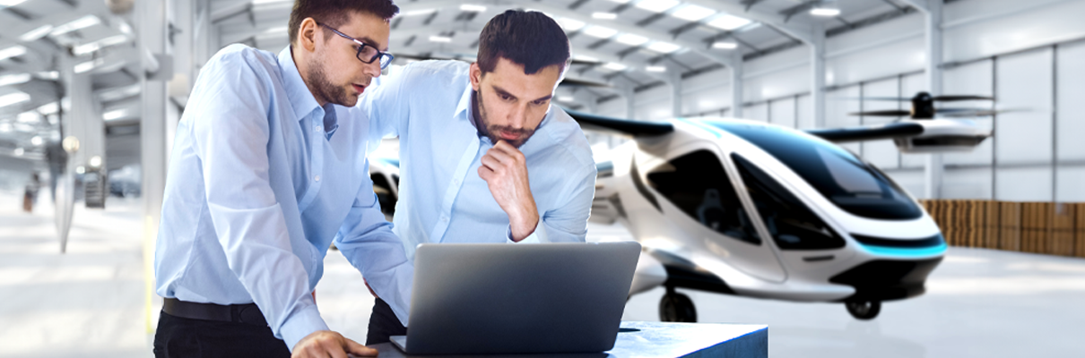 evtol in hanger with 2 men