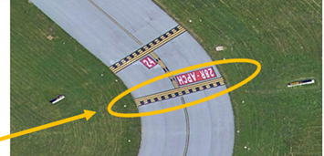 Picture illustrating the limited space between the Hold Short Lines on the turn at Taxiway Delta.