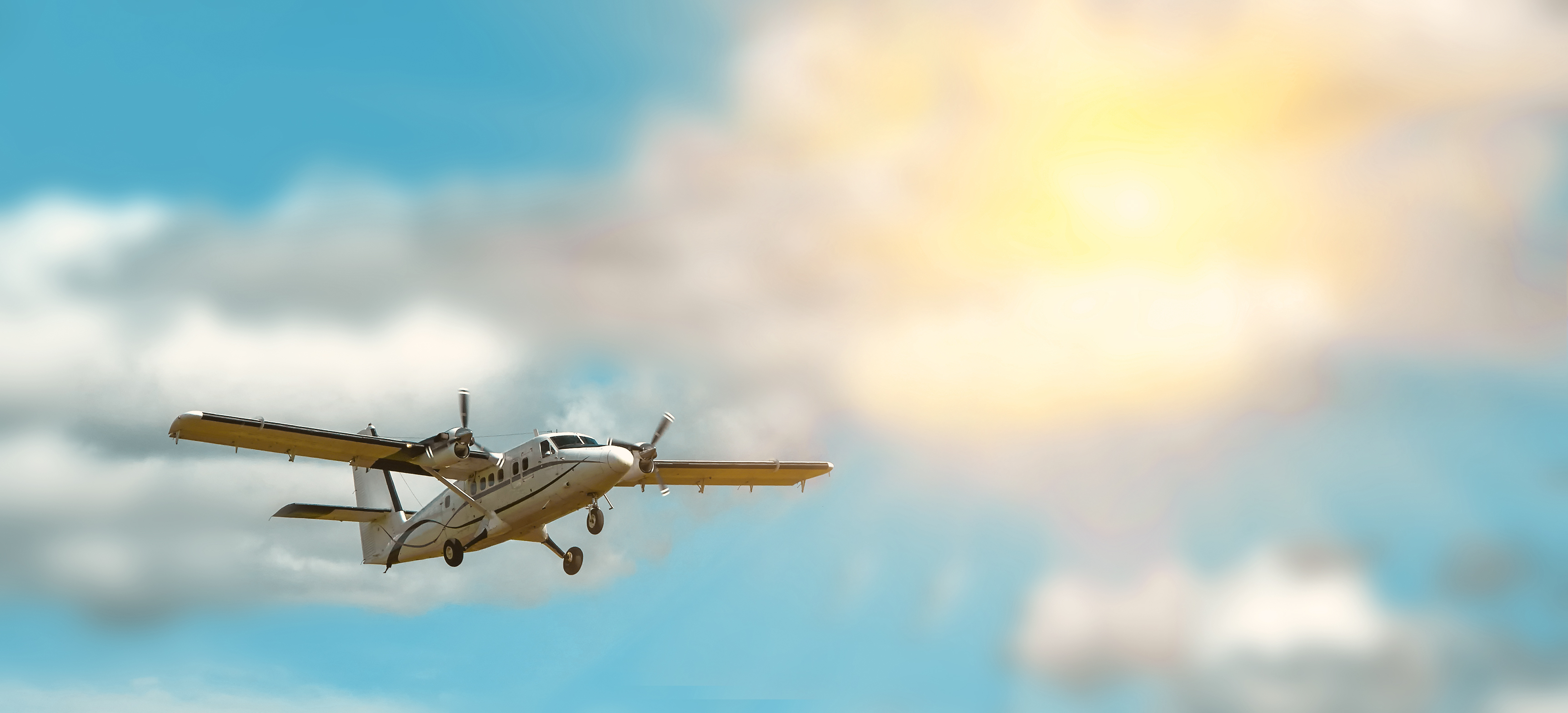 Airplane flying in clouds 