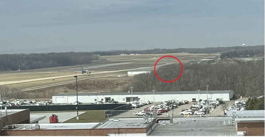 Illustration of blind spot at west arm de-arm pad not visible from tower.