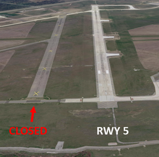 Illustration showing un-named taxiway that lies just south of Runway five/two three. The un-named taxiway is marked with the letter ex.