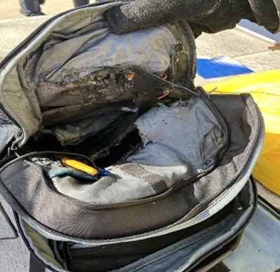 Damage from a lithium battery inside a backpack