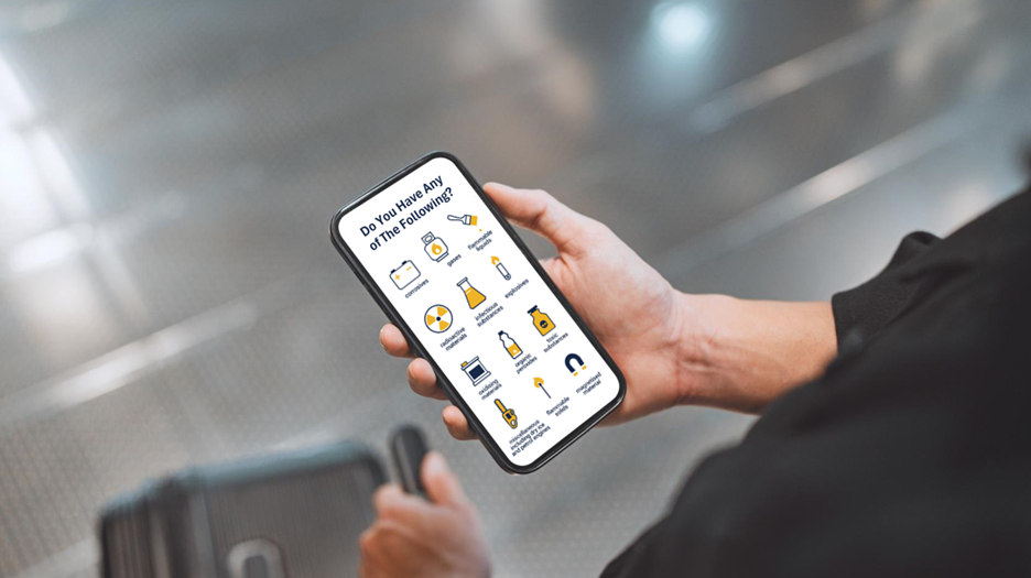 Passenger notification stock image showing hazmat images on passenger's phone