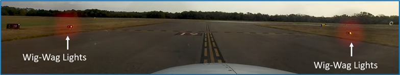 Picture of Wig-wag lights approaching RWY One-Niner.