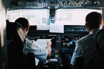 pilots in cockpit