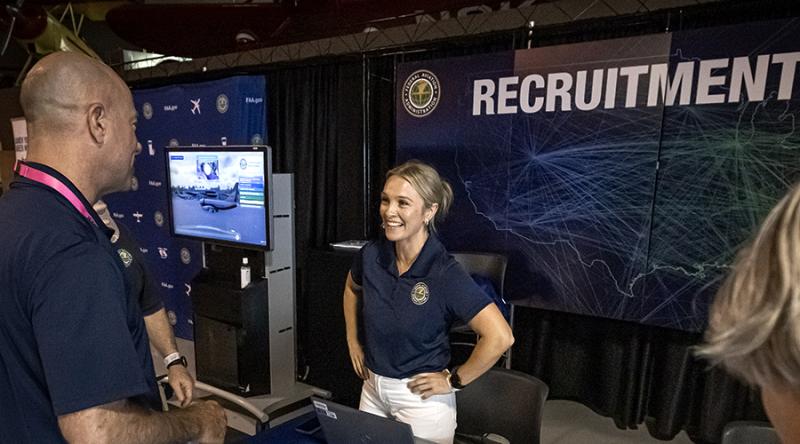 AHR personnel at Oshkosh staffing a recruitment booth