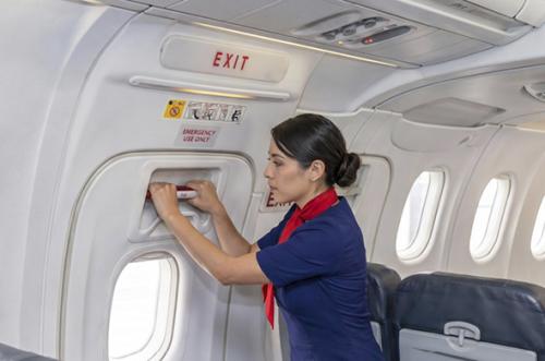 flight attendant opening emergency exit